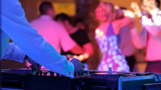 Mastering the Melodies: Unveiling the Ultimate Wedding DJ Experience